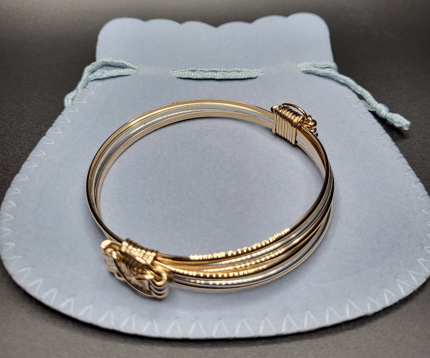 Elephant Hair Bangle Top Angled View and Gift Bag