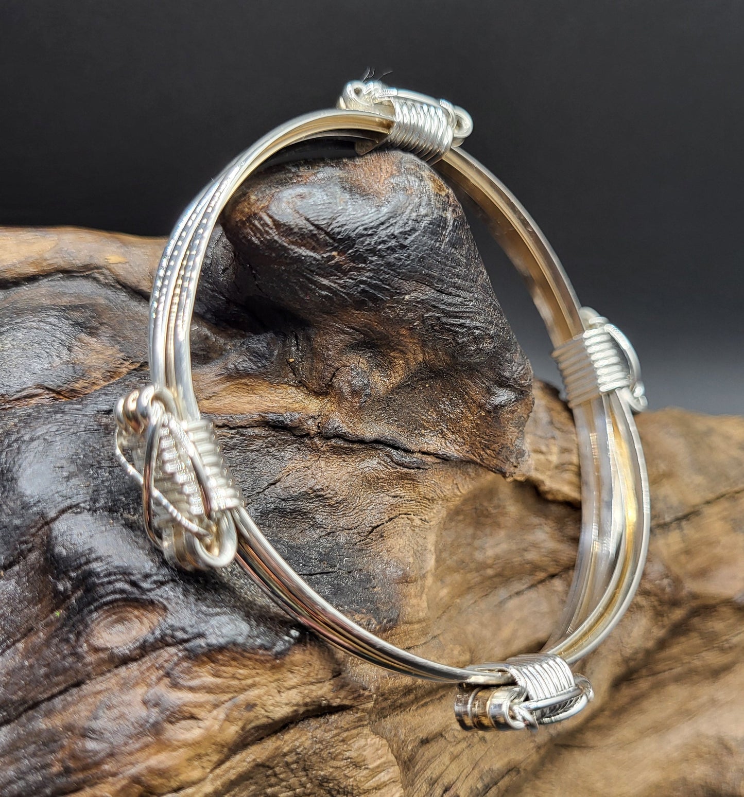 Elephant Hair Bracelet 4 Knot Right Angle Side View On Wood