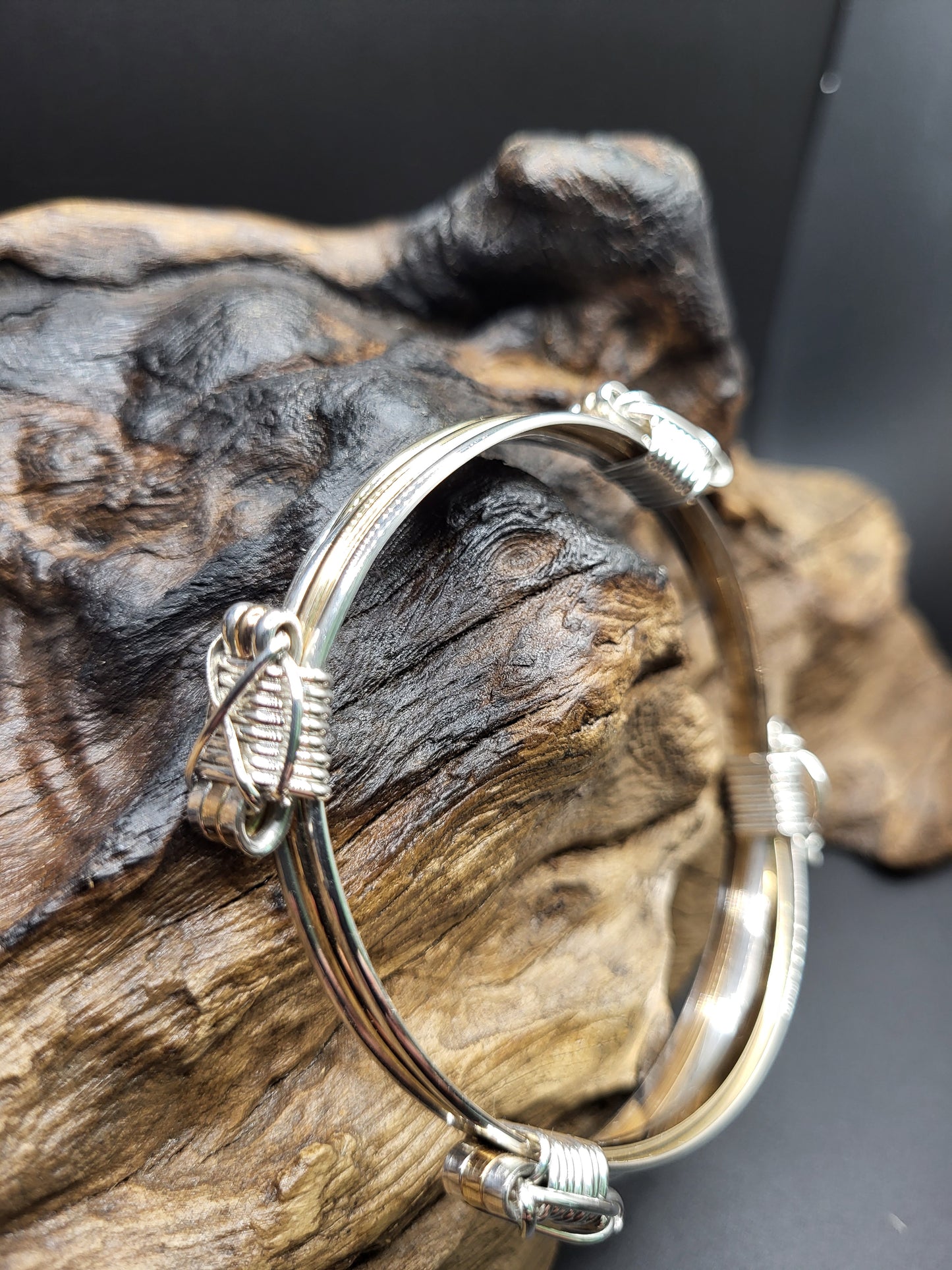 Elephant Hair Bracelet 4 Knot Right Side View on Wood