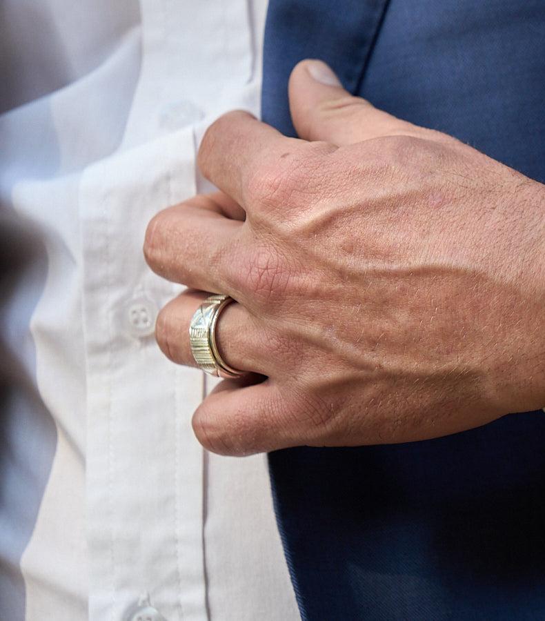 African Design Silver Spinner Ring Being Worn