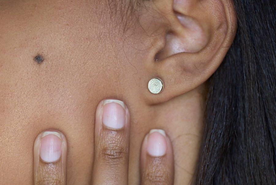 African Silver Stud Earrings being Worn